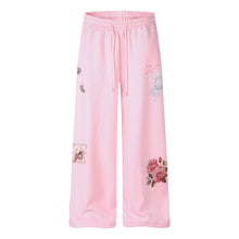 Vue produit — Pantalon de jogging évasé taille basse pour femme, ceinture rayée brodée, coupe ajustée décontractée